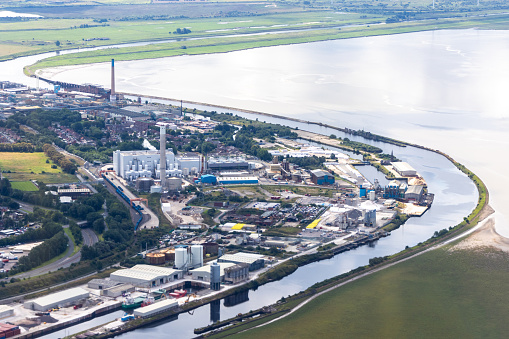 A large industrial factory, in the United Kingdom, seen from above as an aircraft flies overhead.