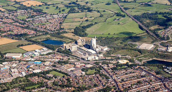 A large industrial factory, in the United Kingdom, seen from above as an aircraft flies overhead.