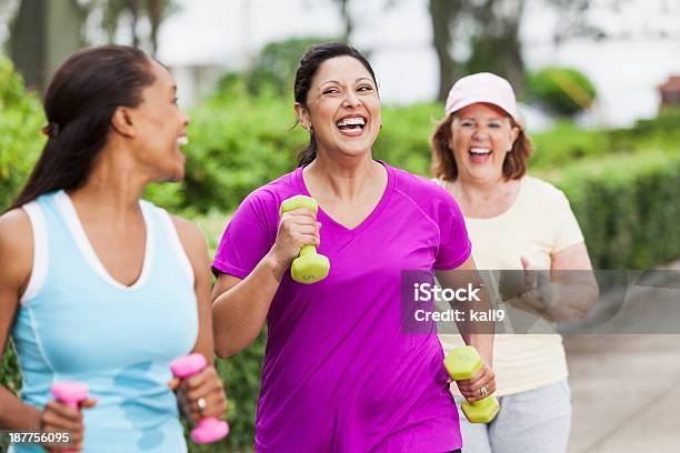 Women Exercising In Park Stock Photo - Download Image Now - Walking, Exercising, Women