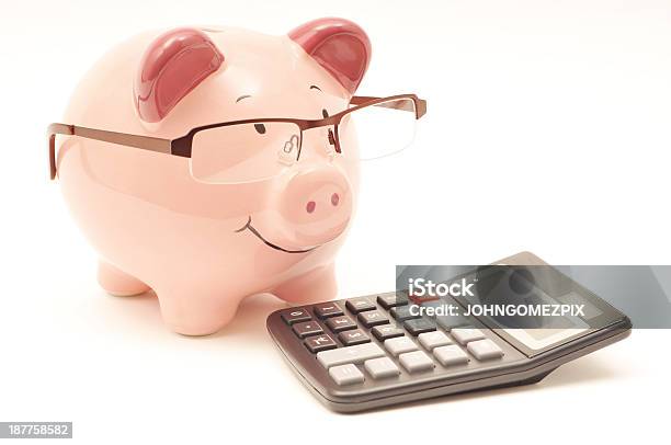 Piggy Bank Wearing Glasses With Calculator Stock Photo - Download Image Now - Banking, Bringing Home The Bacon, Business