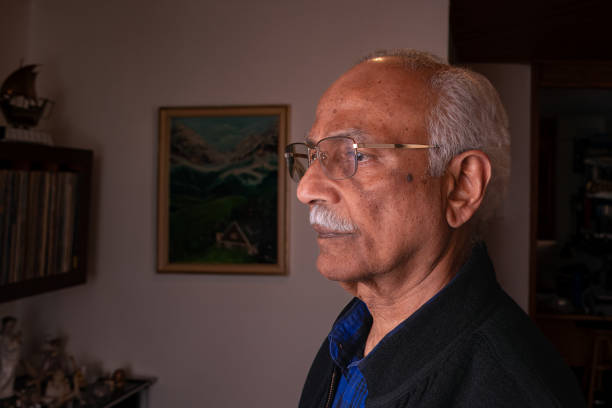 close-up of facial moles on the face of a 76 year old asian indian - eyeball large human eye human nose zdjęcia i obrazy z banku zdjęć