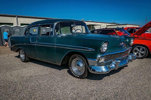 Gulfport, MS - October 01, 2023: High perspective front corner view of a 1956 Chevrolet Bel Air 4 Door Sedan at a local car show.