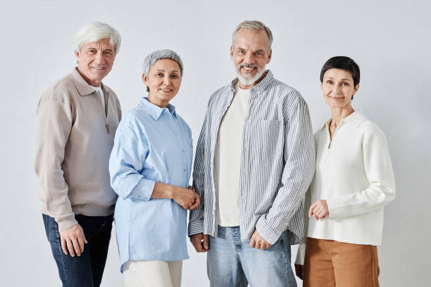 Four Senior People Smiling at Camera