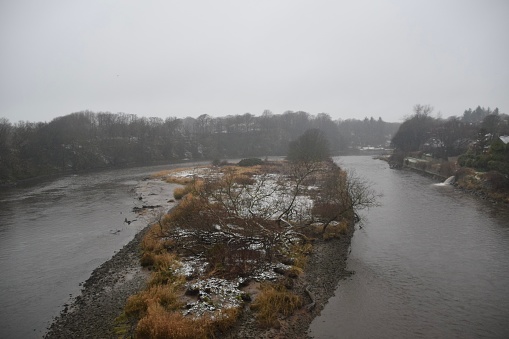 The area surrounding Brig o' Balgownie in Aberdeen, Scotland on a snowy day.