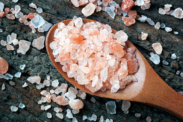 istock Pink Himalayan rock salt on wooden spoon 187769334