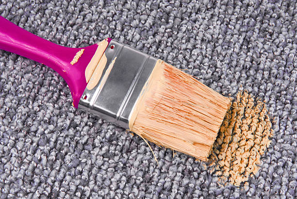 istock stained carpet with paint brush 187773529