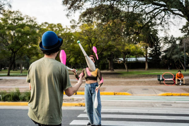istock Jugglers performing in city traffic 1877781367
