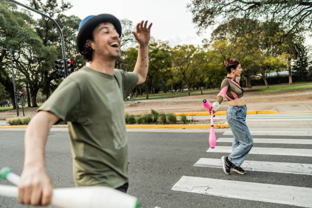 istock Jugglers performing in city traffic 1877782461