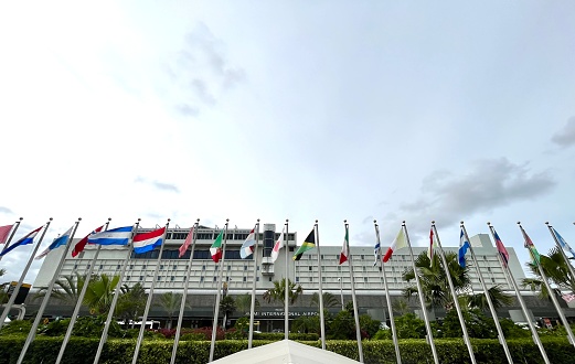 GENEVA, SWITZERLAND - December 17, 2017: Allee des Nations (Avenue of Nations) of the United Nations Palace in Geneva, with the flags of the member countries.