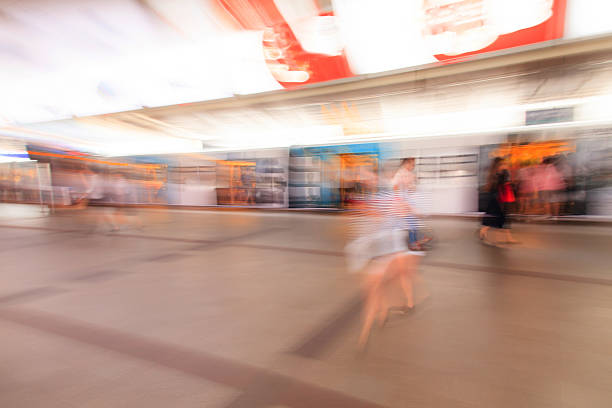 istock City people walking in sky train station 187782580