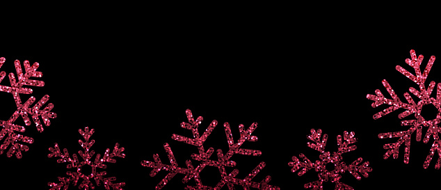 Christmas poster with shiny pink glittering snowflakes on black background. Vector winter illustration