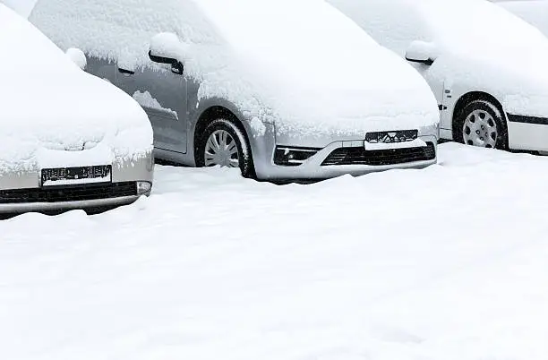 Photo of Parked cars after snowfall