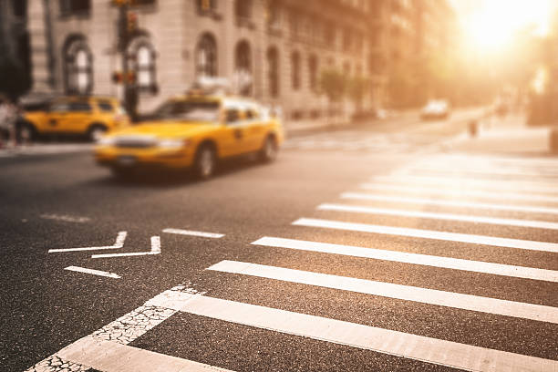 istock taxi running fast on nyc 187785448