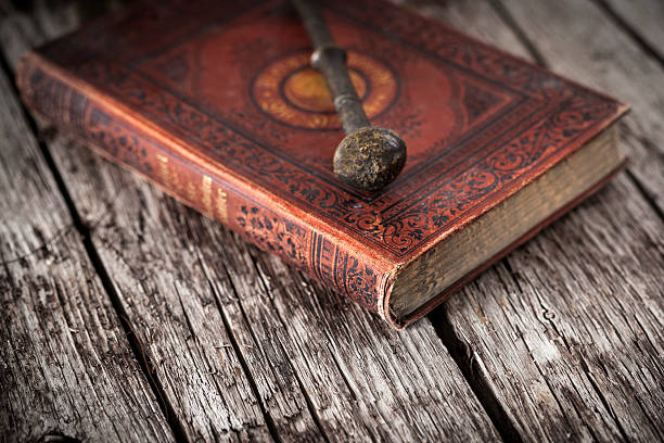 istock Antique book and pestle on wooden board 187786298