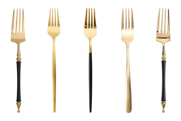 istock Shiny golden forks isolated on white, set 1877878296
