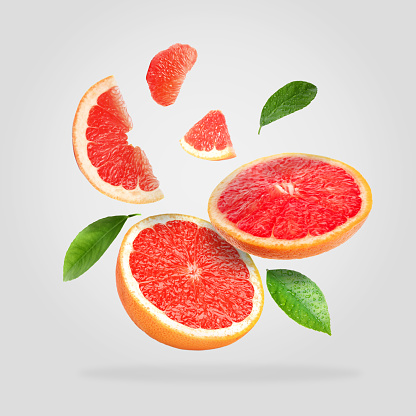Grapefruit slice isolated on white background with Clipping Path.