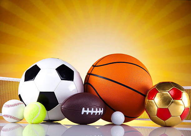 istock Assorted sports equipment and sunset 187791669