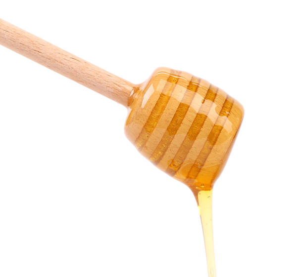 istock Closeup of honey dripping. 187791674