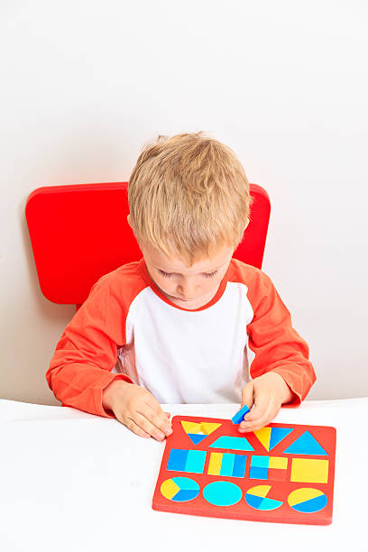 istock little boy learning shapes, early education and daycare concept 187793036