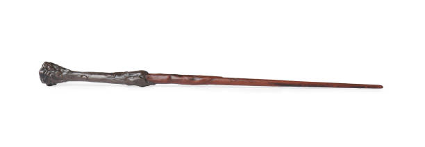 istock One wooden magic wand isolated on white 1877955567