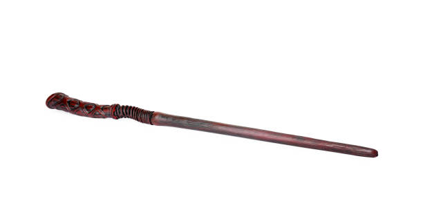 istock One wooden magic wand isolated on white 1877956076