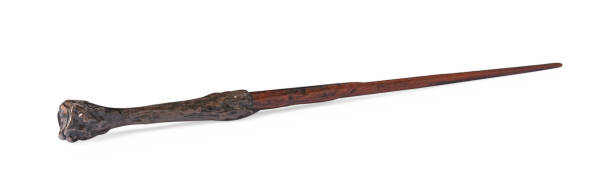 istock One wooden magic wand isolated on white 1877956595