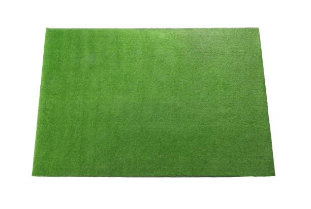 白で隔離された緑の人工芝のカーペット、上のビュー - rug carpet isolated floor ストックフォトと画像