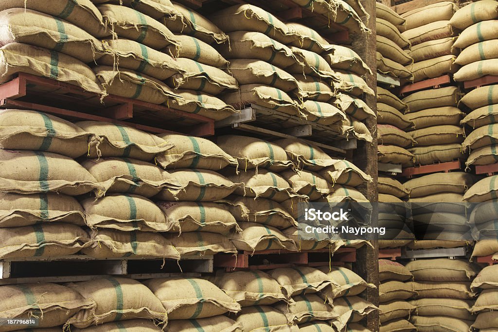 Stack hemp sacks of rice Stack hemp sacks of rice in the warehouse Agriculture Stock Photo