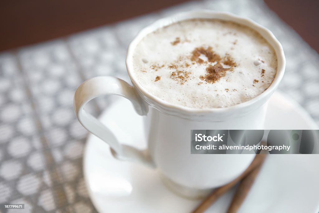 Pumpkin Spice Latte Pumpkin spice latte with cinnamon sticks. Cinnamon Stock Photo