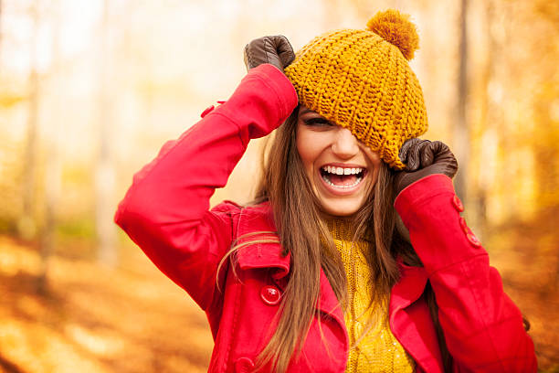 istock Young woman have fun with autumn clothes 187800349