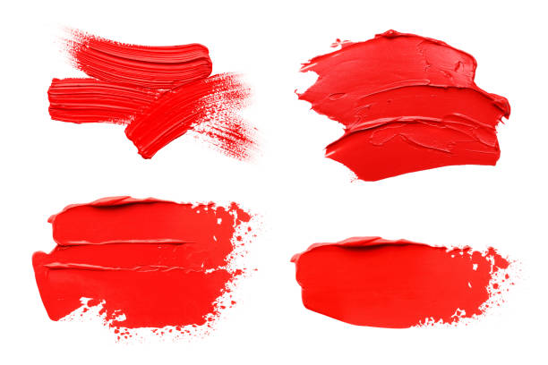 istock Red oil paint strokes isolated on white, top view 1878012042