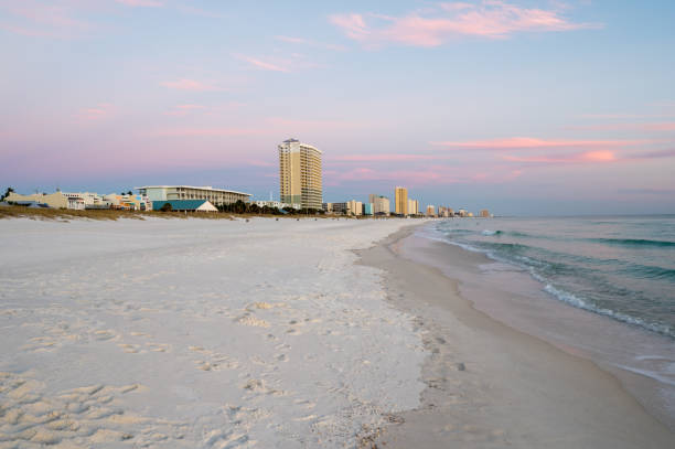 istock Panama City Beach, Florida in evening twilight under colorful wispy cloudscape. 1878016716