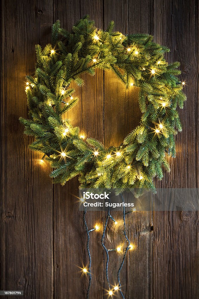 Christmas wreath Christmas wreath on a wooden door Wreath Stock Photo