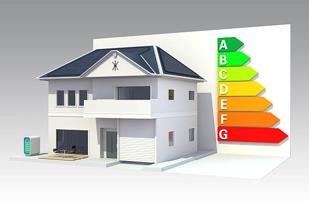 Smart house with roof mounted solar panels,energy classification chart stock photo