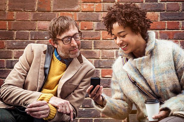 istock Couple looking on the phone 187803185