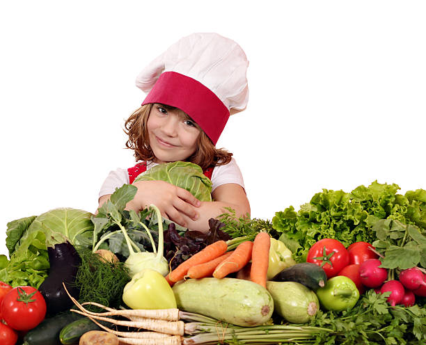 istock beautiful little girl cook hold cabbage 187803284