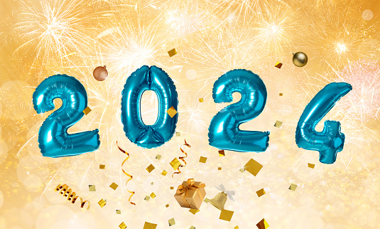 New 2024 Year. Blue number shaped balloons, gift boxes, baubles and confetti on golden background with fireworks