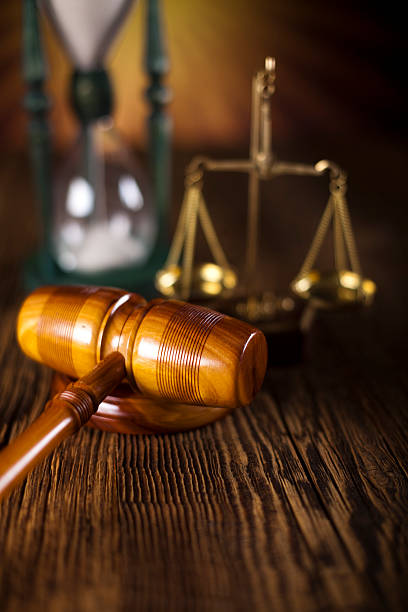 istock Mallet of judge, legal code and scales 187803916