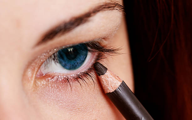 istock pretty lady wearing makeup for eyes 187803965