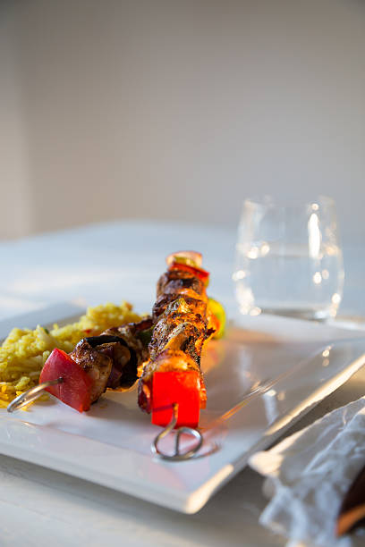 istock Chicken skewers with curry rice 187804122