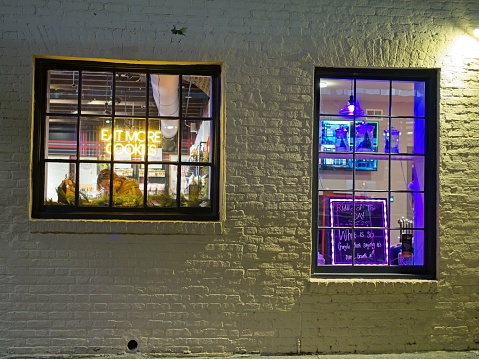 Charleston, South Carolina - USA, November 30, 2023. Byrd's famous Cookie shop store window at night in downtown Charleston South Carolina.