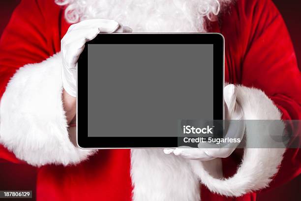 Santa Holding A Tablet With Blank Space Stock Photo - Download Image Now - Digitally Generated Image, Santa Claus, Christmas