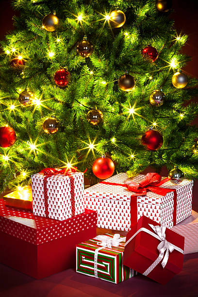 istock Christmas tree and presents close-up 187806204