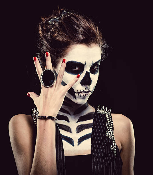 Woman with skeleton face art