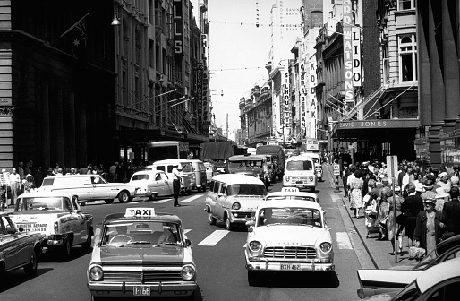 Heavy traffic and taxis in George Street, Sydney near Martin Place in 1967.