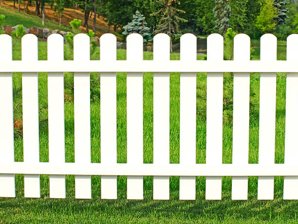 istock White fence in garden. 187808780
