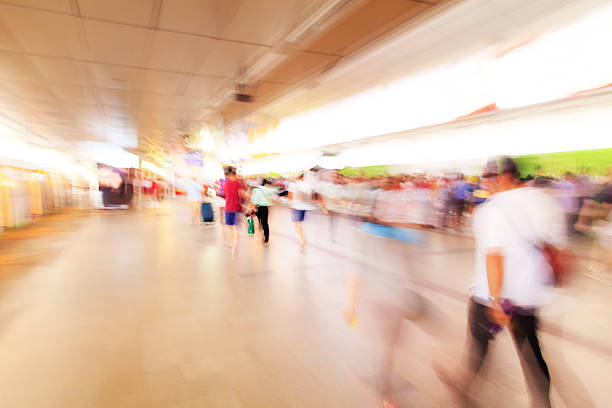 istock City people walking in sky train station 187810193