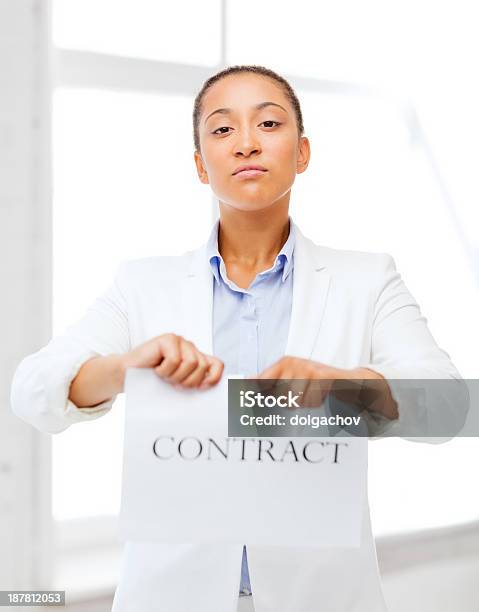 African Businesswoman Tearing Contract Stock Photo - Download Image Now - Adult, African Ethnicity, African-American Ethnicity