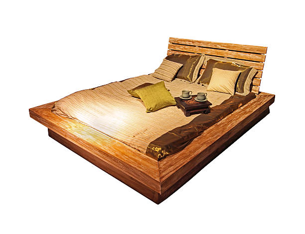 istock Wooden bed isolated 187814411