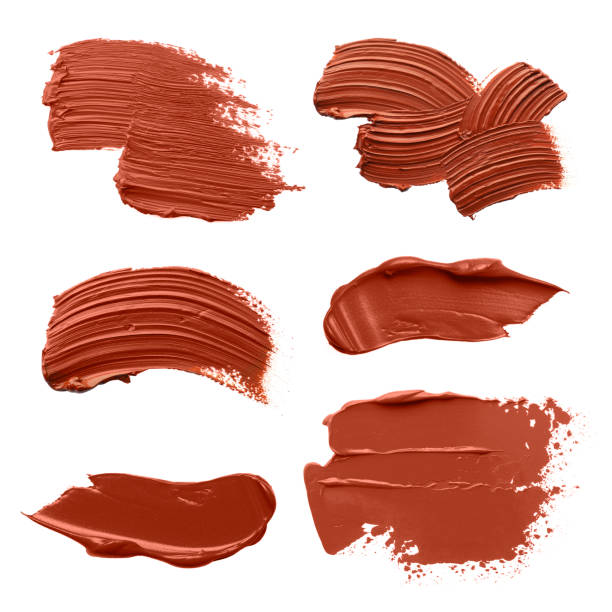 istock Brown oil paint strokes isolated on white, top view 1878146929
